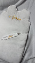 Gigoteuse blanche 25e et attache tétine 10e