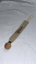 Attache tétine beige foncé